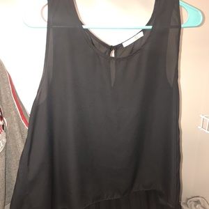 Sheer black tank top with creases on the back